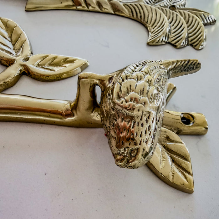 Brass hook bird