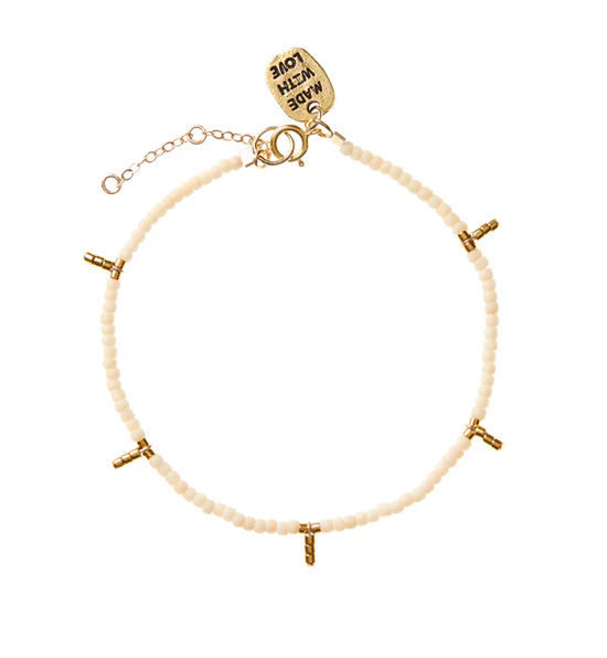 Bracelet simple blanc cassée à 5 gouttes or de Tanzanie