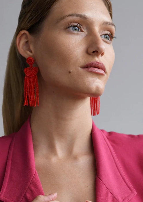Boucles d'oreilles pendante avec disque en perle rouge de Tanzanie